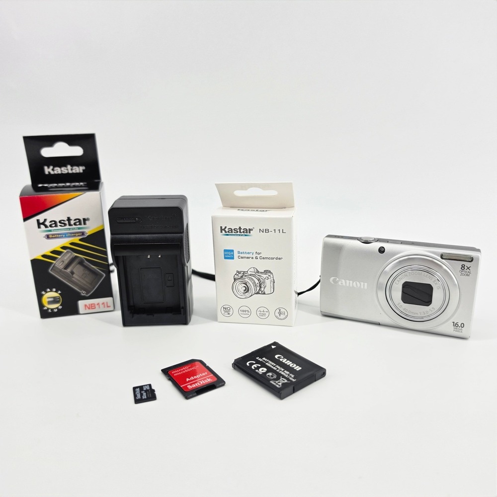 Canon PowerShot A4000 IS 16MP Digital Camera Silver 8x Zoom Tested Bundle 32GB